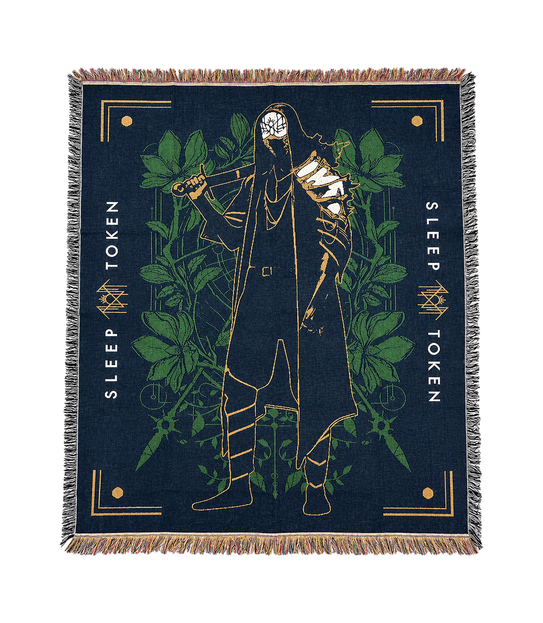 A square woven throw blanket with fringe edges, featuring a dark navy blue background, a central figure outlined in gold, green botanical motifs, and the words 'SLEEP TOKEN' printed vertically on both sides.